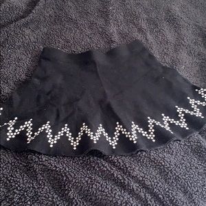 Black A-line skirt with white design